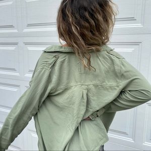 Top is an American Eagle button up in a soft green color size M.